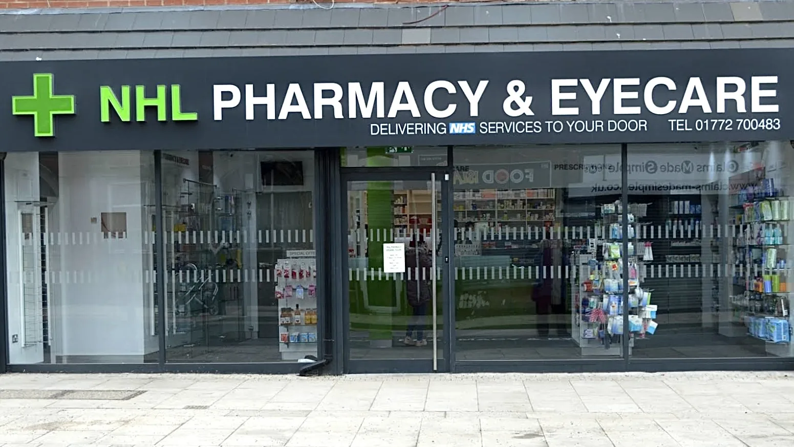 The NHL Pharmacy & Eyecare shopfront on New Hall Lane, Preston.